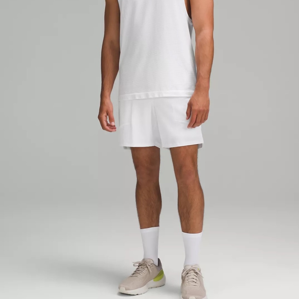 Lululemon 9” white training shorts men’s size large with built-in compression